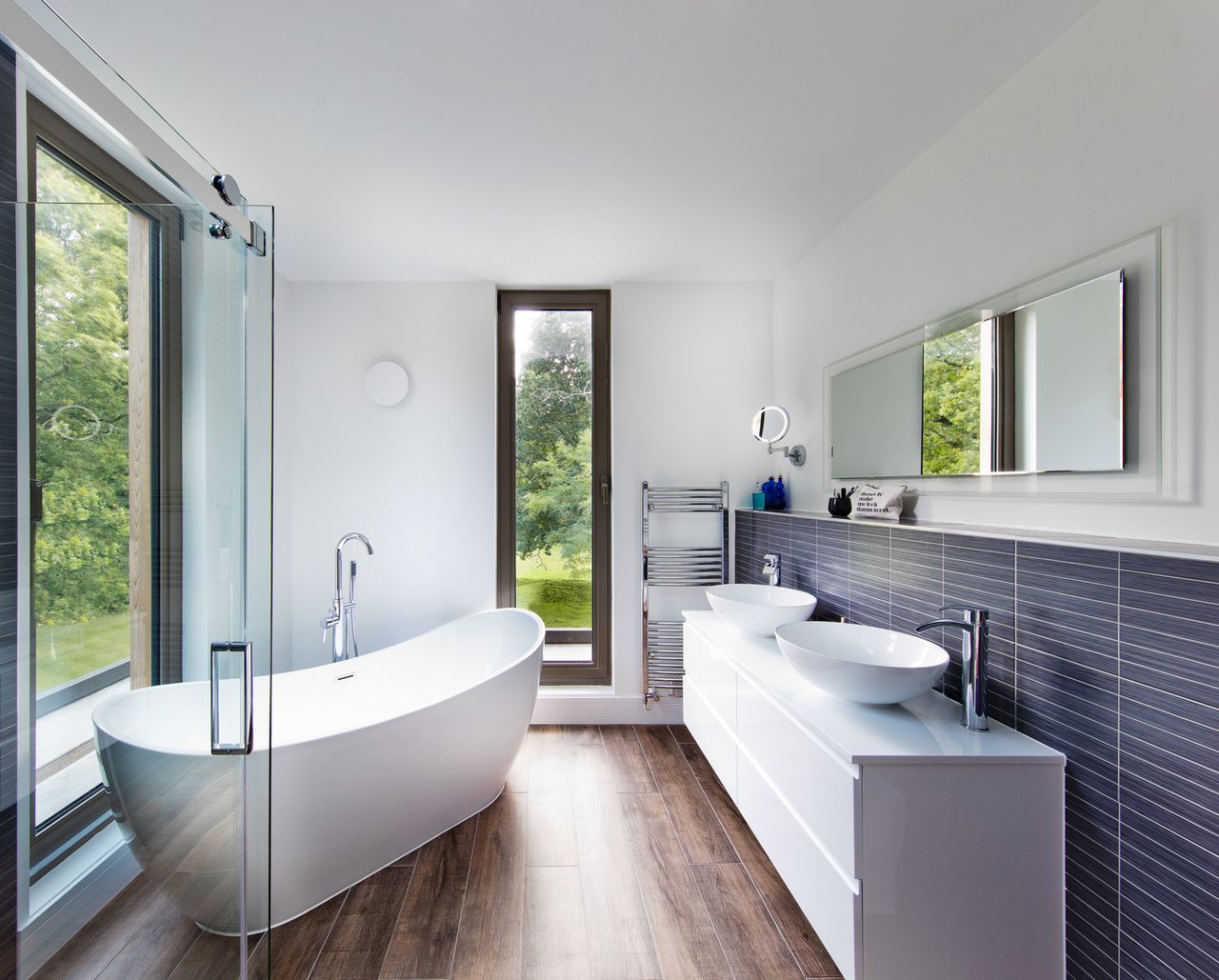 freestanding bath in bathroom with glazing