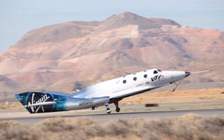 Virgin Galactic's SpaceShipTwo, the VSS Unity, lands at the Mojave Air and Space Port in Mojave, California after making its first powered test flight on April 5, 2018.