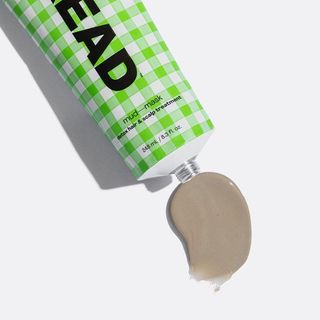 A green checkered tube of Bread Beauty Supply Mud Mask for Black-owned beauty and skincare brands.