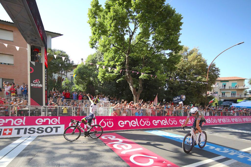 JESI, ITALY - MAY 17: (L-R) Hailu Biniam Girmay of Eritrea and Team Intermarch&Atilde;&copy; - Wanty - Gobert Mat&Atilde;&copy;riaux celebrates at finish line as stage winner ahead of Mathieu Van Der Poel of Netherlands and Team Alpecin - Fenix during the 105th Giro d'Italia 2022, Stage 10 a 196km stage from Pescara to Jesi 95m / #Giro / #WorldTour / on May 17, 2022 in Jesi, Italy. (Photo by Michael Steele/Getty Images)