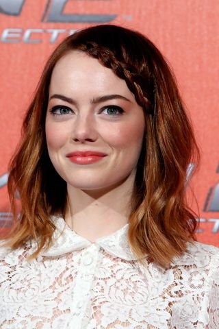 Emma Stone with a plaited bob as she attends 'The Amazing Spider-Man 2: Rise Of Electro' Rome Photocall at Grand Hotel St Regis on April 14, 2014 in Rome, Italy.