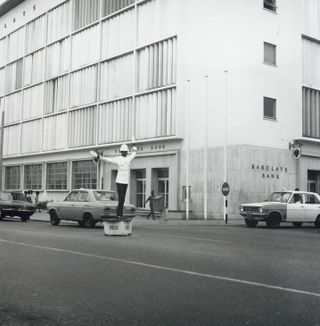 A traffic officer on duty in the business district (Atta Mills High Street), Accra, 1970s