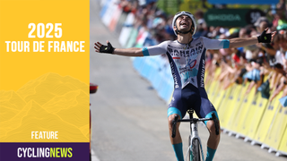 Bahrain Victorious's French rider Lenny Martinez celebrates as he crosses the finish line to win the 8th and final stage of the 77th edition of the Criterium du Dauphine cycling race, 133,3 km between Val-d'Arc and Val-Cenis - Plateau du Mont Cenis, on June 15, 2025. (Photo by Anne-Christine POUJOULAT / AFP) (Photo by ANNE-CHRISTINE POUJOULAT/AFP via Getty Images)