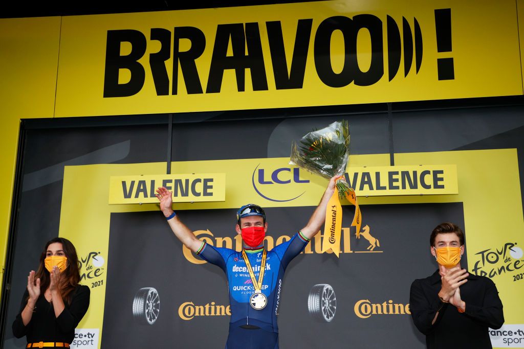VALENCE FRANCE JULY 06 Mark Cavendish of The United Kingdom and Team Deceuninck QuickStep stage winner celebrates at podium during the 108th Tour de France 2021 Stage 10 a 1907km stage from Albertville to Valence LeTour TDF2021 on July 06 2021 in Valence France Photo by Chris GraythenGetty Images