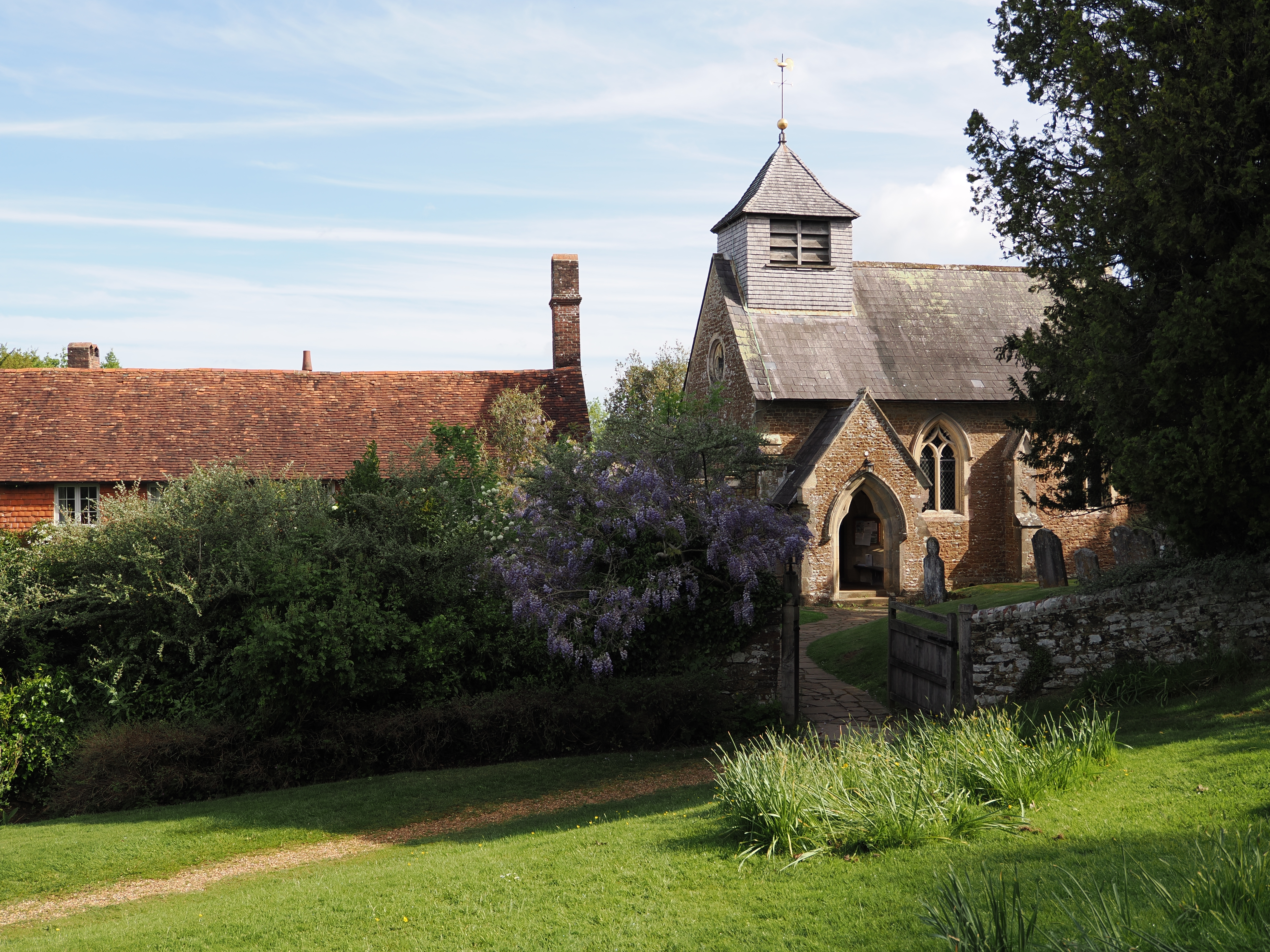 A church with trees in the foreground