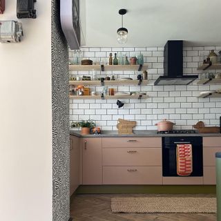 kitchen with white tiles and floating shelves