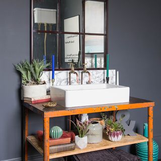 metallic table with wash basin