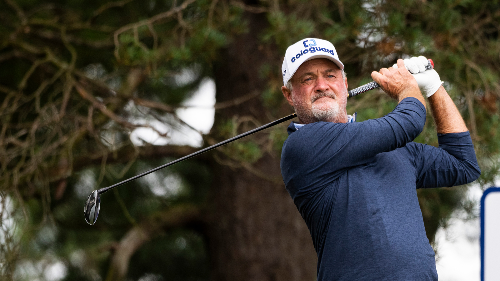 Jerry Kelly hits a fairway wood