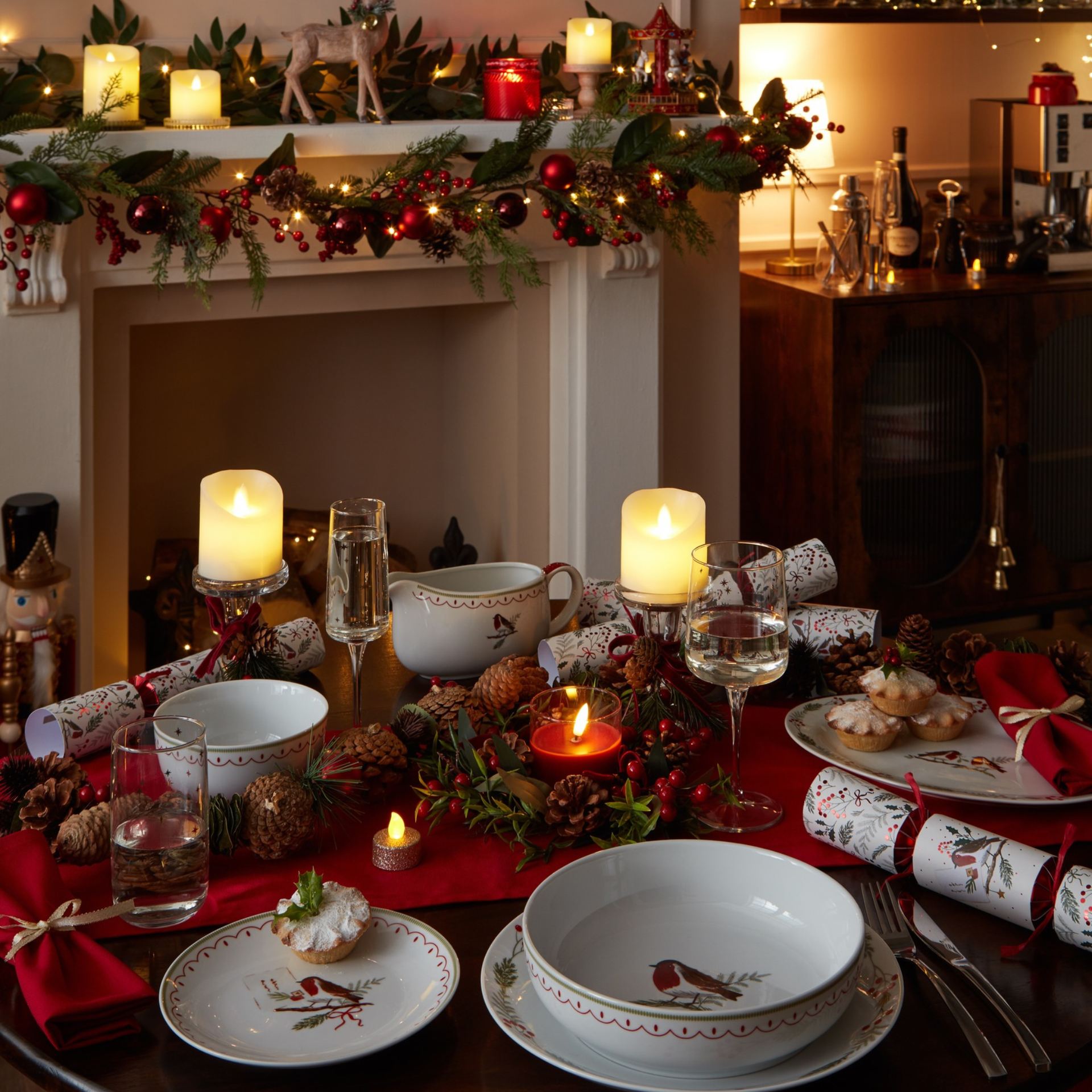 Morrisons Home robin tableware on a decorated table for Christmas.