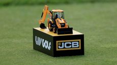 A JCB LIV Golf tee marker at LIV Golf UK