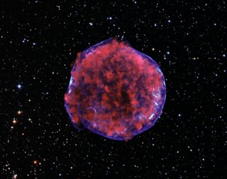 This image comes from a very deep Chandra observation of the Tycho supernova remnant. Low-energy X-rays (red) in the image show expanding debris from the supernova explosion and high energy X-rays (blue) show the blast wave, a shell of extremely energetic