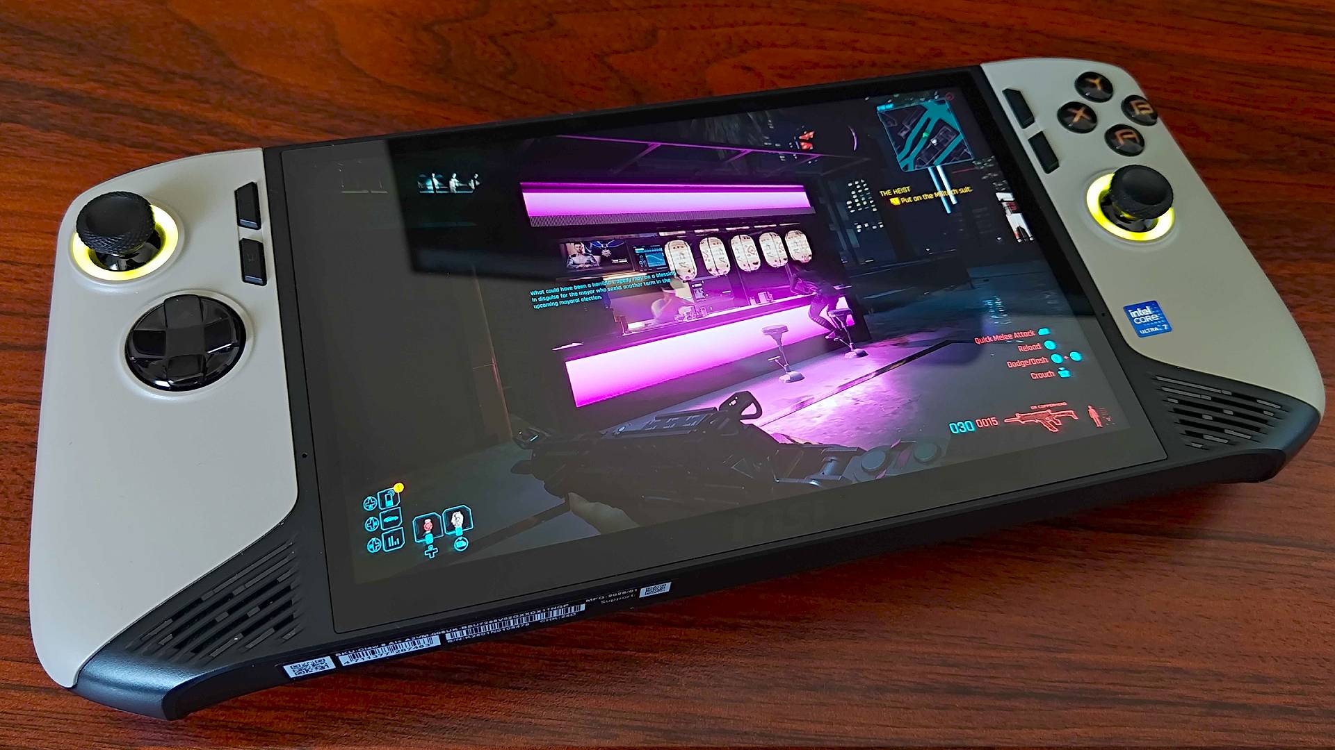 MSI Claw 8 AI+ handheld with Cyberpunk 2077 gameplay on screen featuring neon Ramen stand.
