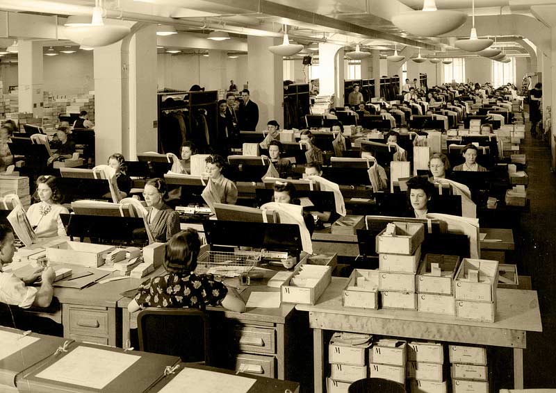 1940 census workers transferring data to punch cards.