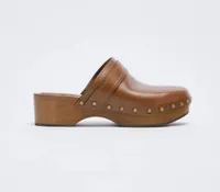 Zara, Wooden Leather Clogs, $149 £99.99