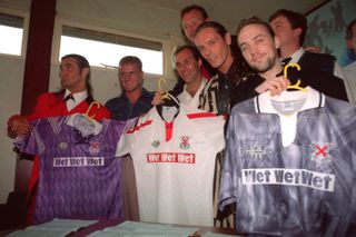 Members of the band Wet Wet Wet pose with Clydebank shirts, manufactured by Matchwinner, after agreeing a sponsorship deal with the club, 1993