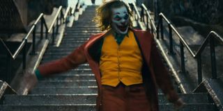 Joker dances on the stairs