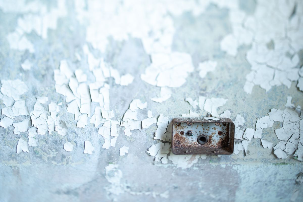 Photo of a wall in a derelict building taken with the Nikon Z f and Nikkor PC-E 45mm f/2.8