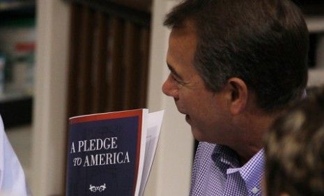 John Boehner shows off the &amp;quot;Pledge To America&amp;quot; during an unveiling event hosted by Tart Lumber in Sterling, Virginia. 