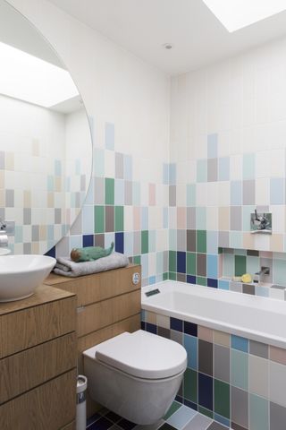 A family bathroom decorated with tiles