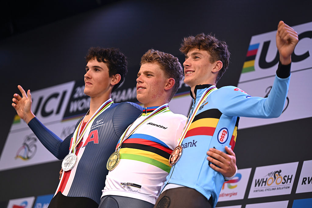 KIGALI, RWANDA - SEPTEMBER 23: (L-R) Silver medalist Ashlin Barry and Team United States, gold medalist Michiel Mouris and Team Netherlands and bronze medalist Seff Van Kerckhove and Team Belgium pose on the podium during the medal ceremony after the 98th UCI Cycling World Championships Kigali 2025 - Men Junior Individual Time Trial a 22.6km race from Kigali to Kigali on September 23, 2025 in Kigali, Rwanda. (Photo by Dario Belingheri/Getty Images)