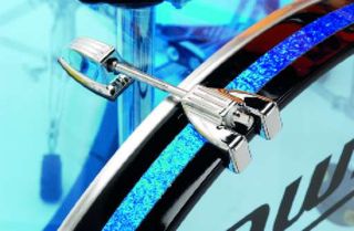 The bass drum has wooden hoops inlaid with blue glitter.