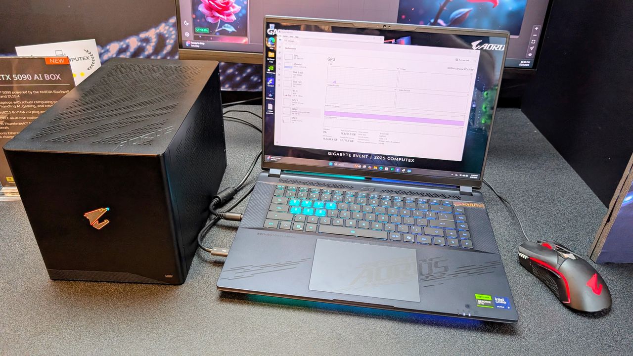 Gigabyte Aorus RTX 5090 AI box connected to laptop at Computex 2025