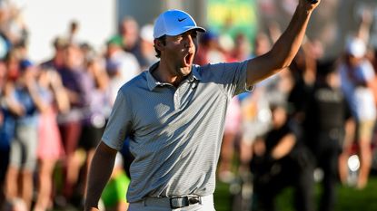 Scottie Scheffler celebrates defeating Patrick Cantlay in a playoff during the final round of the 2022 WM Phoenix Open