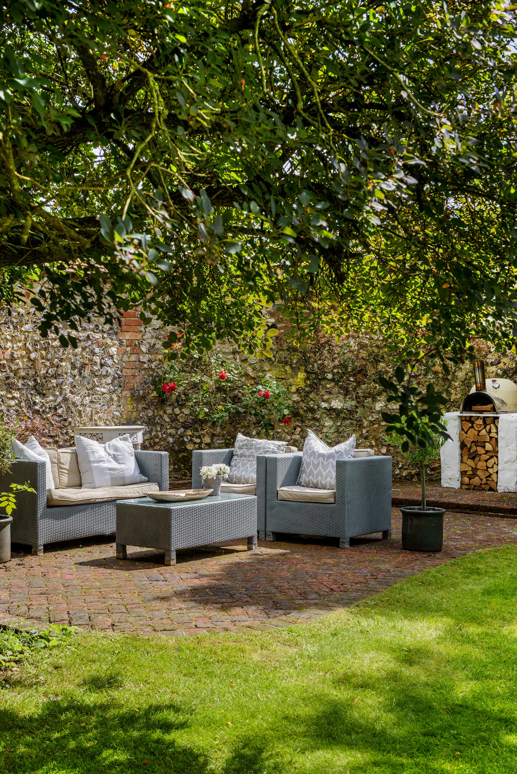 brick patio with outdoor furniture