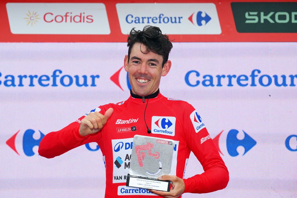LAGOS DE COVADONGA SPAIN SEPTEMBER 03 Ben OConnor of Australia and Team Decathlon AG2R La Mondiale celebrates at podium as Red Leader Jersey winner during the La Vuelta 79th Tour of Spain 2024 Stage 16 a 1815km stage Luanco to Lagos de Covadonga 1069m UCIWT on September 03 2024 in Lagos de Covadonga Spain Photo by Tim de WaeleGetty Images