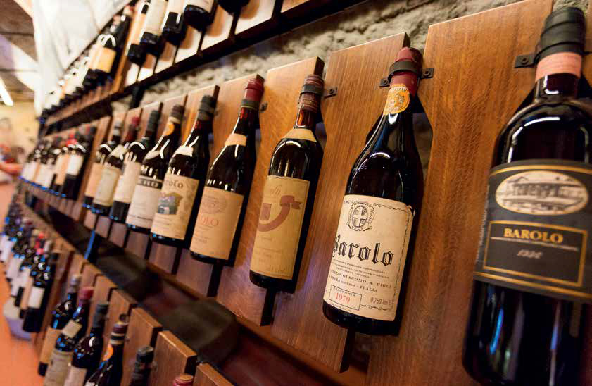Bottles on display in a Piedmont enoteca