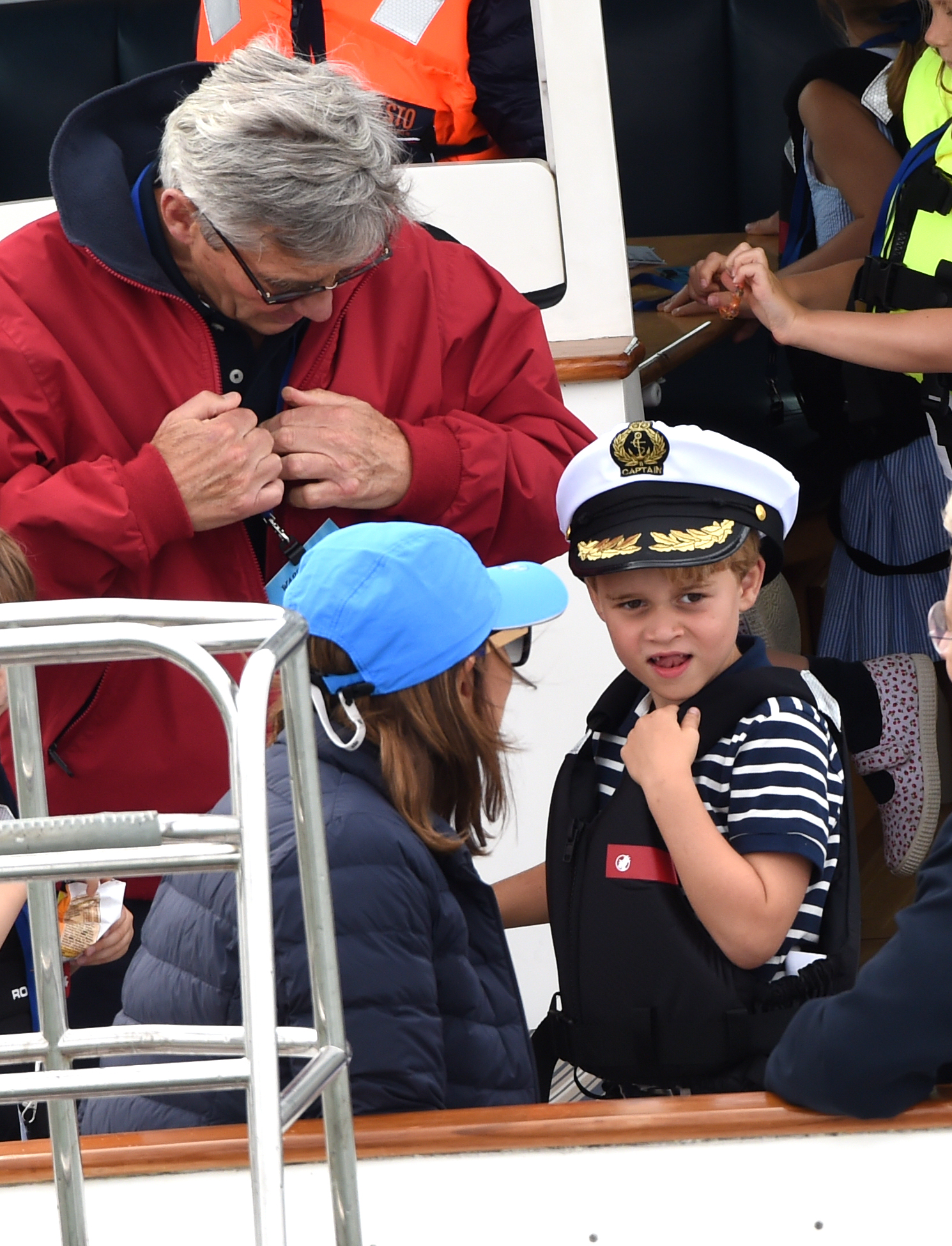 Prince George in a boat with Carole Middleton at the King's Cup Regatta in 2019
