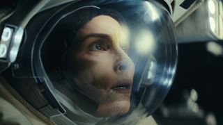 Noomi Rapace's Jo stares in awe at something in space in Apple TV Plus' Constellation TV show