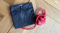 The Beats Powerbeats 4 and carrying pouch