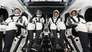 Commander Matthew Dominick, a keen astrophotographer, pilot Michael Barratt, and mission specialists Jeanette Epps and Alexander Grebenkin 