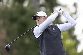 Ludvig Aberg strikes a tee shot with a driver