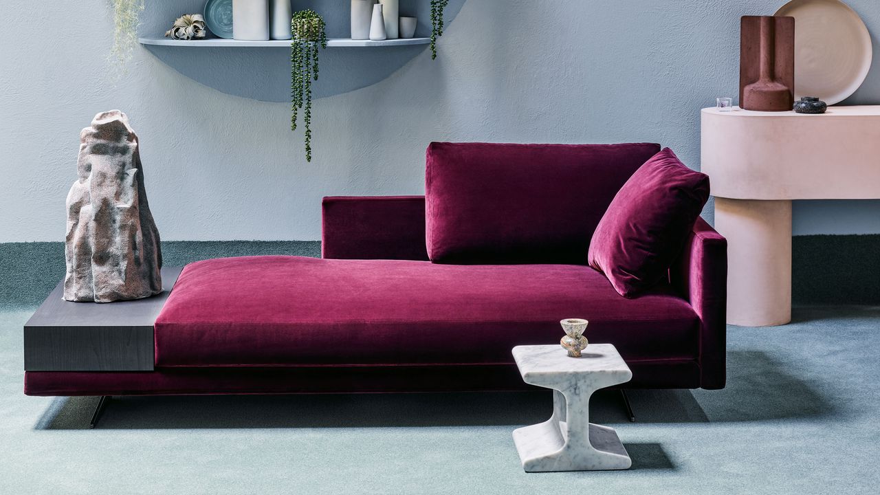 a living room with a light blue carpet