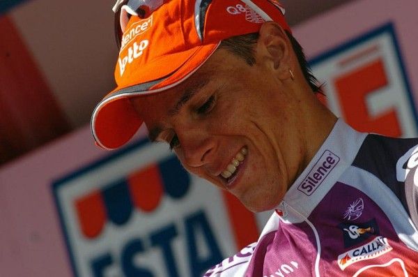 Philippe Gilbert (Silence - Lotto) on the podium for winning the Giro's 20th stage.