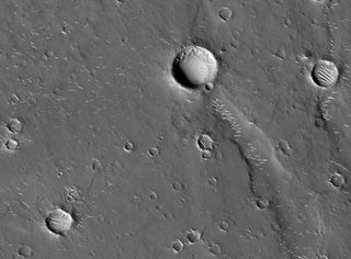 A portion of Mars' Utopia Planitia impact basin, as photographed by the HiRISE camera aboard NASA's Mars Reconnaissance Orbiter. China's Tianwen-1 Mars rover will touch down in a section of Utopia Planitia in 2021.