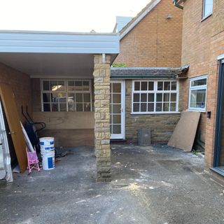 The old car port that has been transformed into a media room on a budget thanks to an infill extension, savvy planning and lots of DIY