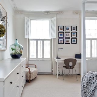 room with white wall and white drawer