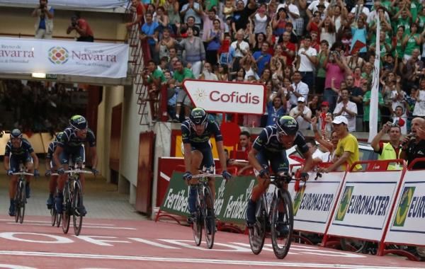 Jonathan Castroviejo leads his Movistar team across the finish line for a stage 1 TTT win.