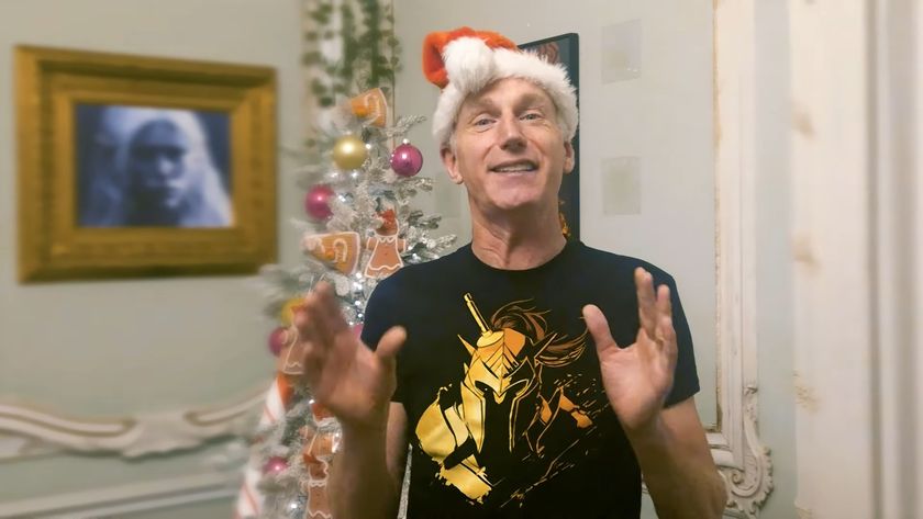 Swen Vincke in a Santa hat and Larian t-shirt.