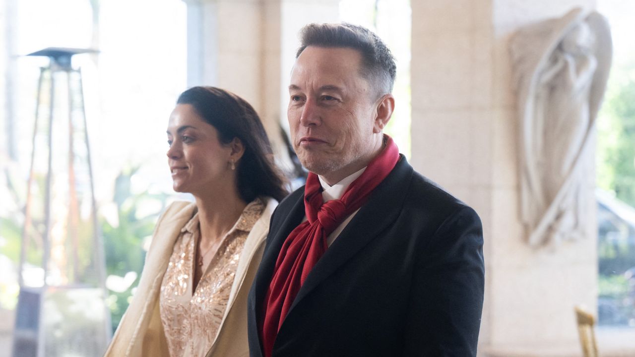 Elon Musk and venture capitalist Shivon Zilis arriving at the wedding of White House Deputy Chief of Staff Dan Scavino