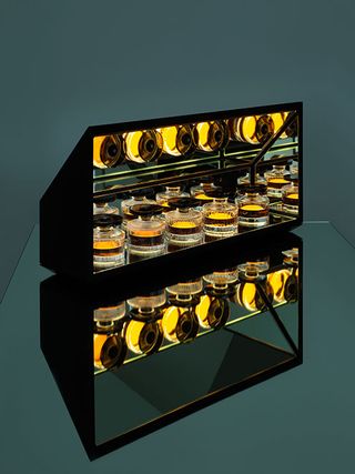 Tasting cabinet with mirrored backing