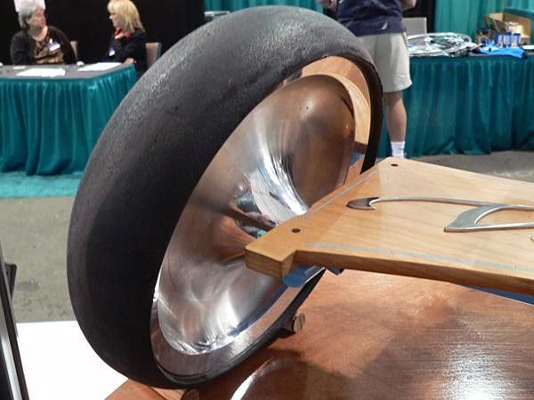 The inside view of the custom wheels is almost prettier than the outside view (check out the polished lip). White also custom-turned some rubber stock to use as tires.