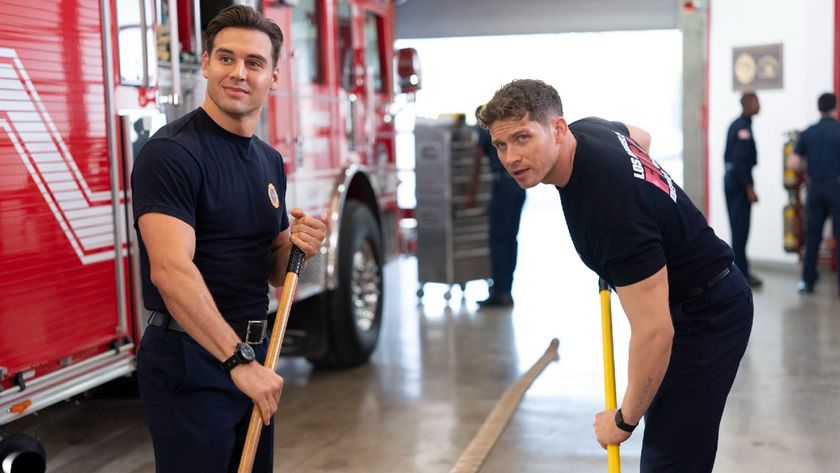 Eddie and Buck cleaning the floor of the firehouse on 9-1-1.