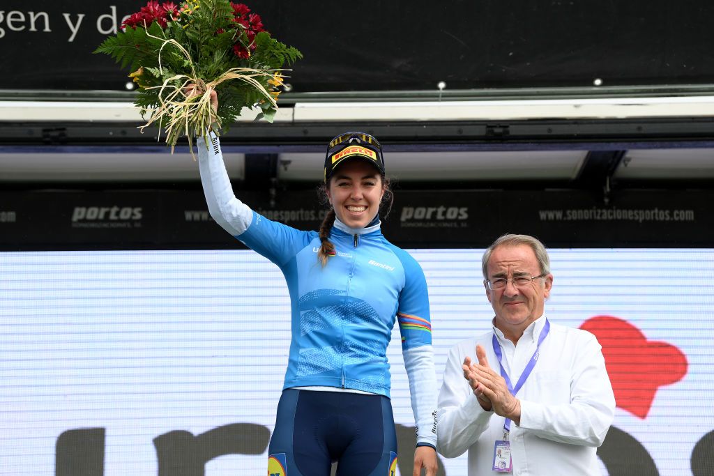 CANICOSA DE LA SIERRA SPAIN MAY 19 Shirin van Anrooij of The Netherlands and Team Lidl Trek celebrates at podium as UCI Womens WorldTour yBest Young Blue Jersey winner during the 9th Vuelta a Burgos Feminas 2024 Stage 4 a 122km stage from Pearanda de Duero to Canicosa de la Sierra 1144m UCIWWT on May 19 2024 in Canicosa de la Sierra Spain Photo by Alex BroadwayGetty Images