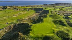 A general view from the air of the par-3 16th hole at Royal Portrush, also known as Calamity Corner