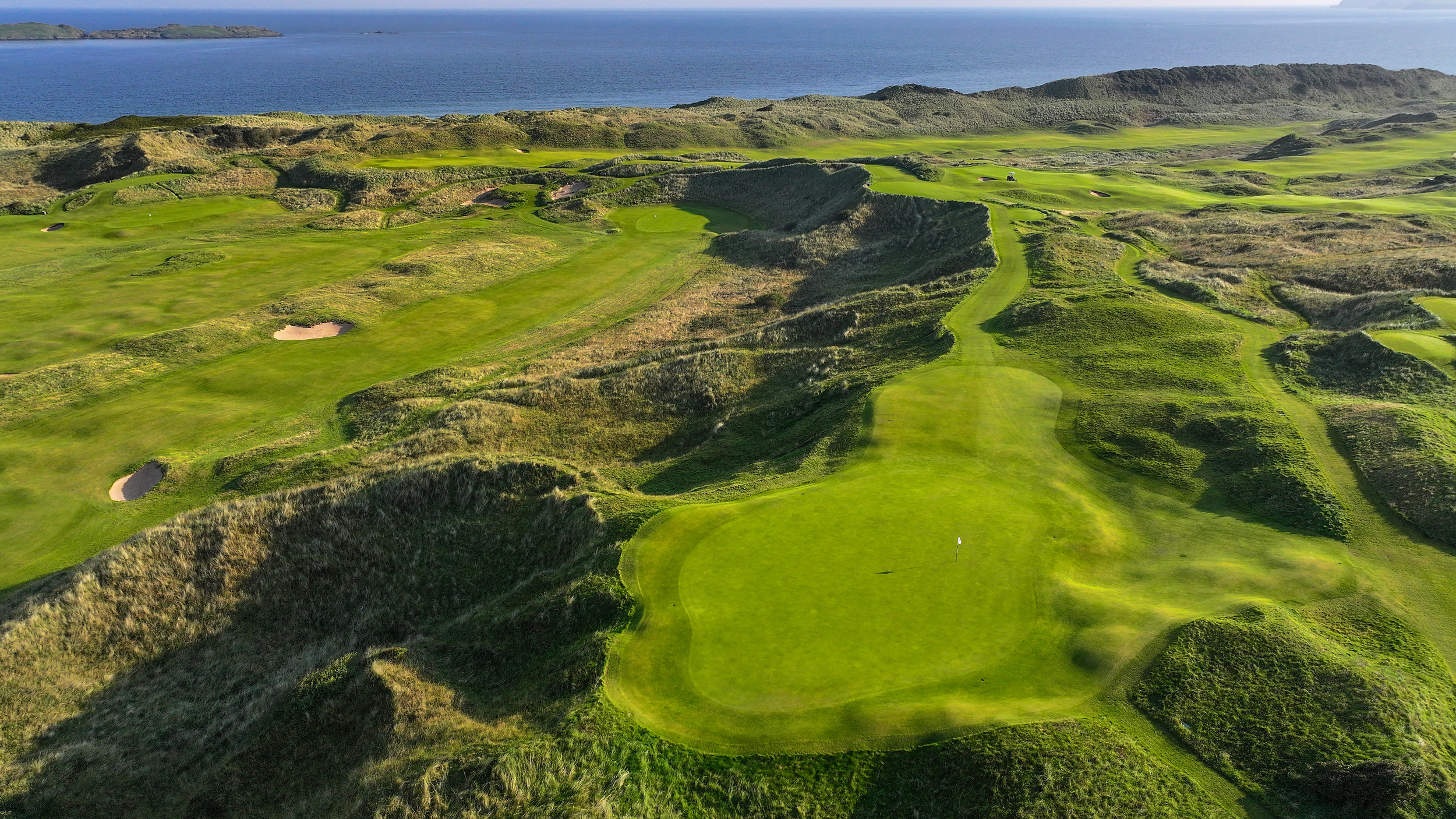 A general view from the air of the par-3 16th hole at Royal Portrush, also known as Calamity Corner