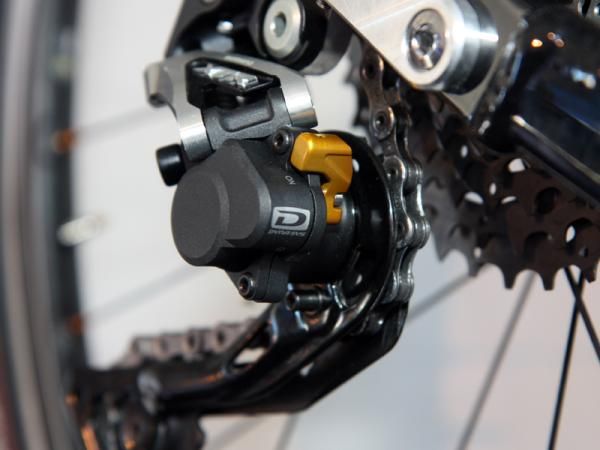 When in the "on" position, the Shimano XTR Shadow Plus pulley cage can only move easily in one direction, thus keeping the chain from bouncing around on rough terrain.